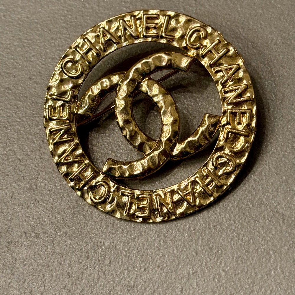 Double C Gold Circular Logo Pin